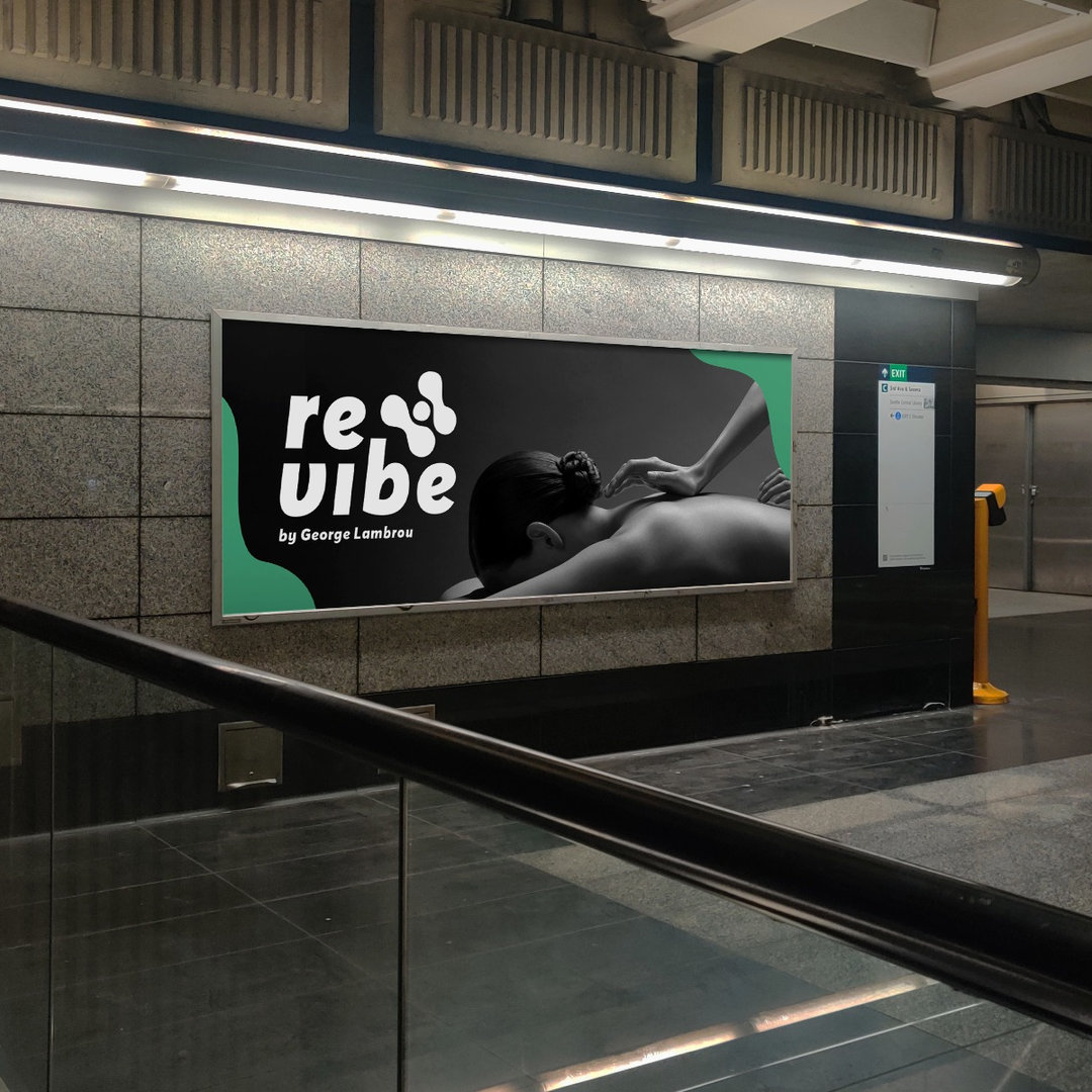 Re:vibe by George Lambrou branding on a station billboard